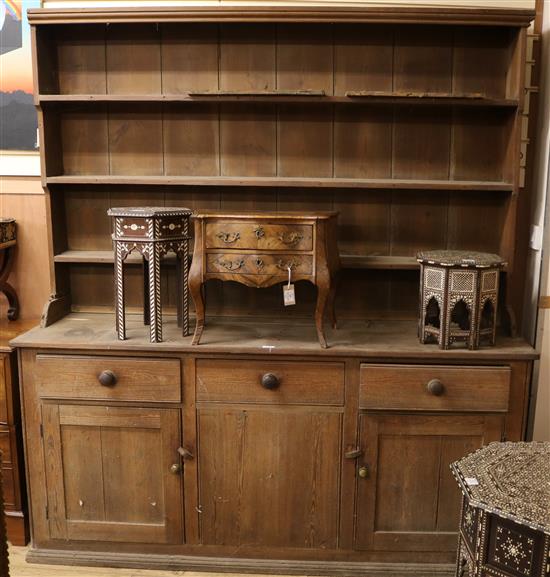 A Victorian pine dresser with rack, W.183cm